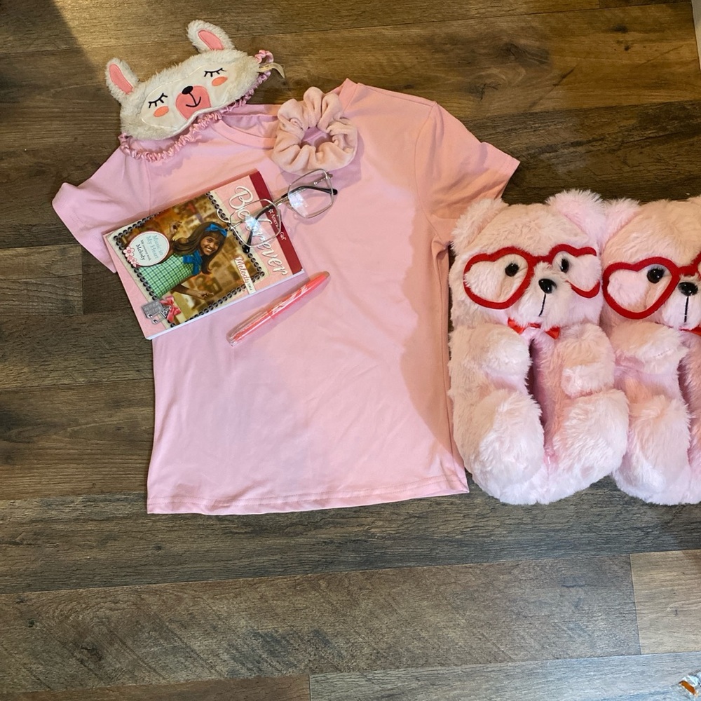 Pink and purple sleeping pajama shirts.